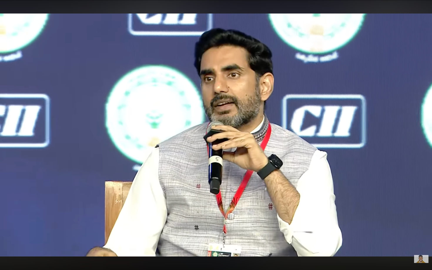 A speaker on the CII stage