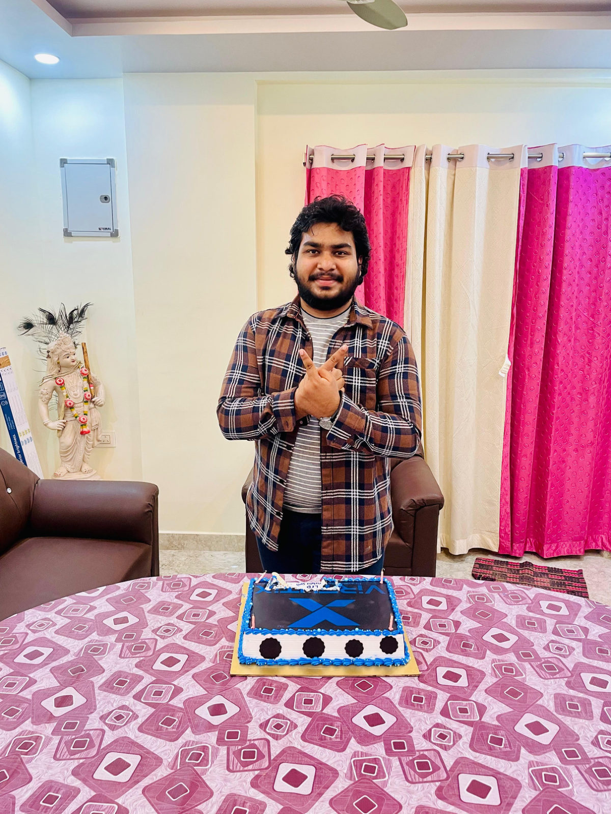 Venkatesh Kadali with the anniversary cake