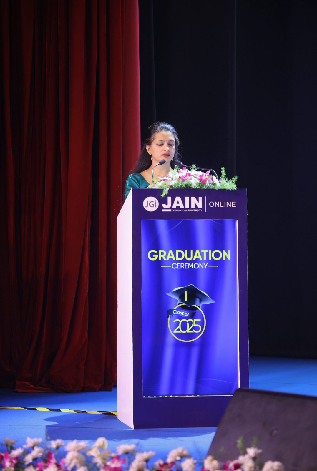 A speaker at the graduation podium