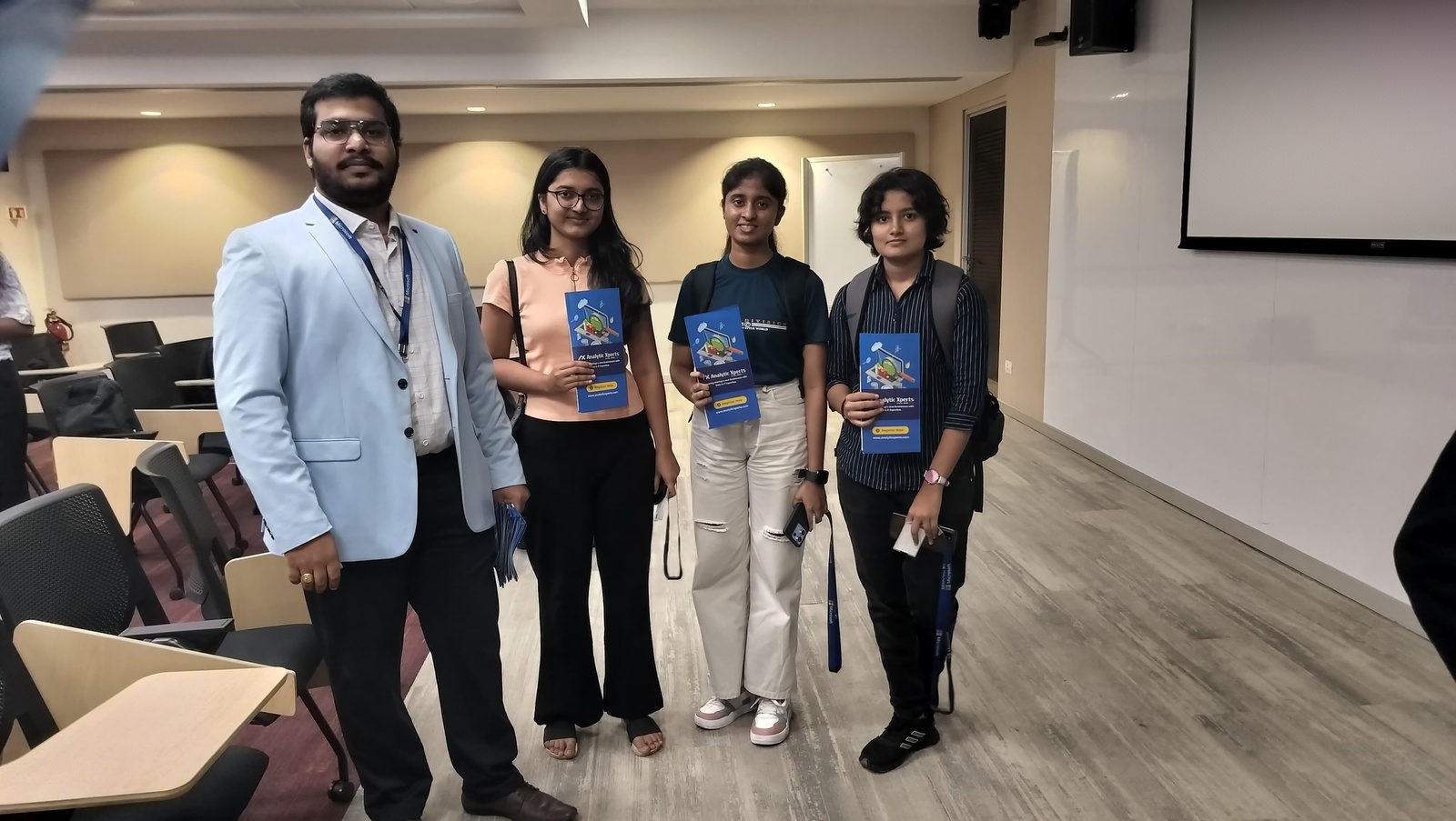 Students with the AnalyticXperts team