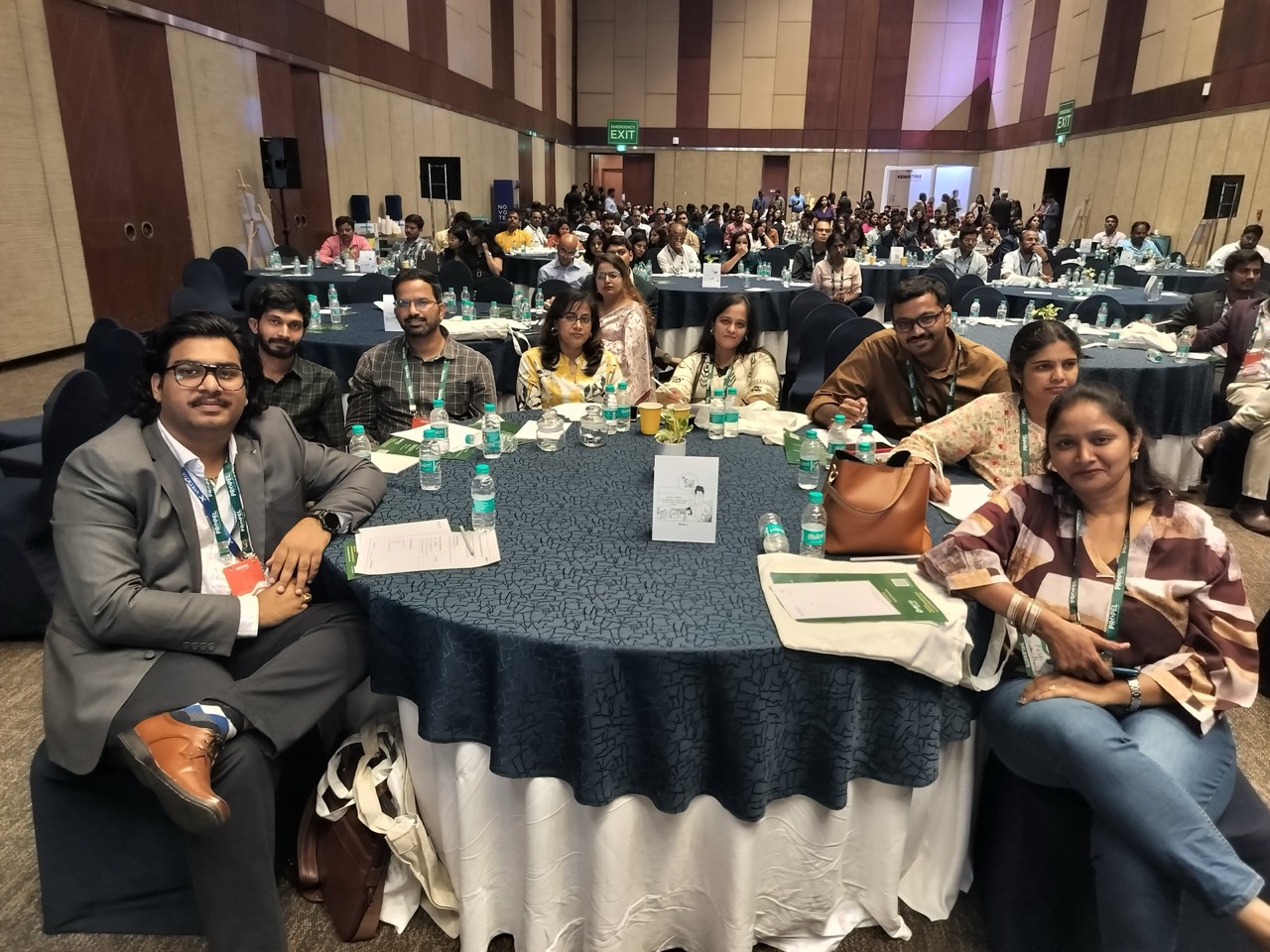 Venkatesh Kadali seated with HR leaders at a round table