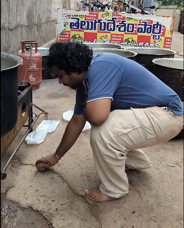 Kadali Venkatesh lighting the stove for the Annadanam