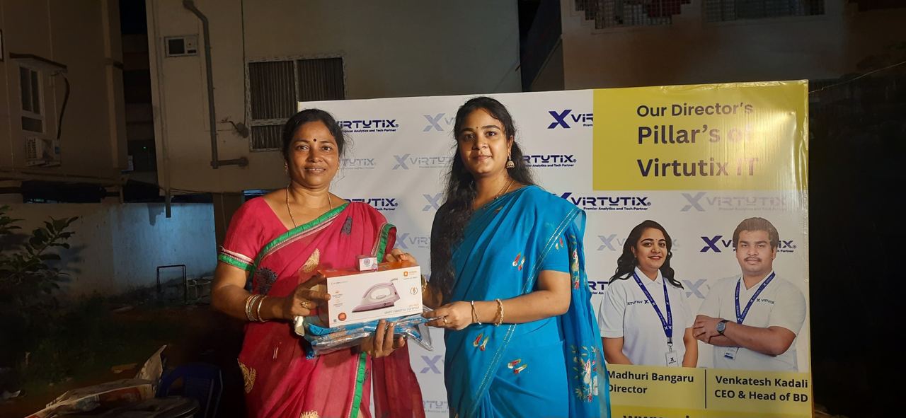 A participant receiving her gift