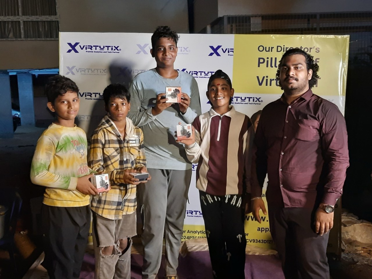 Young Rangoli winners with their prizes