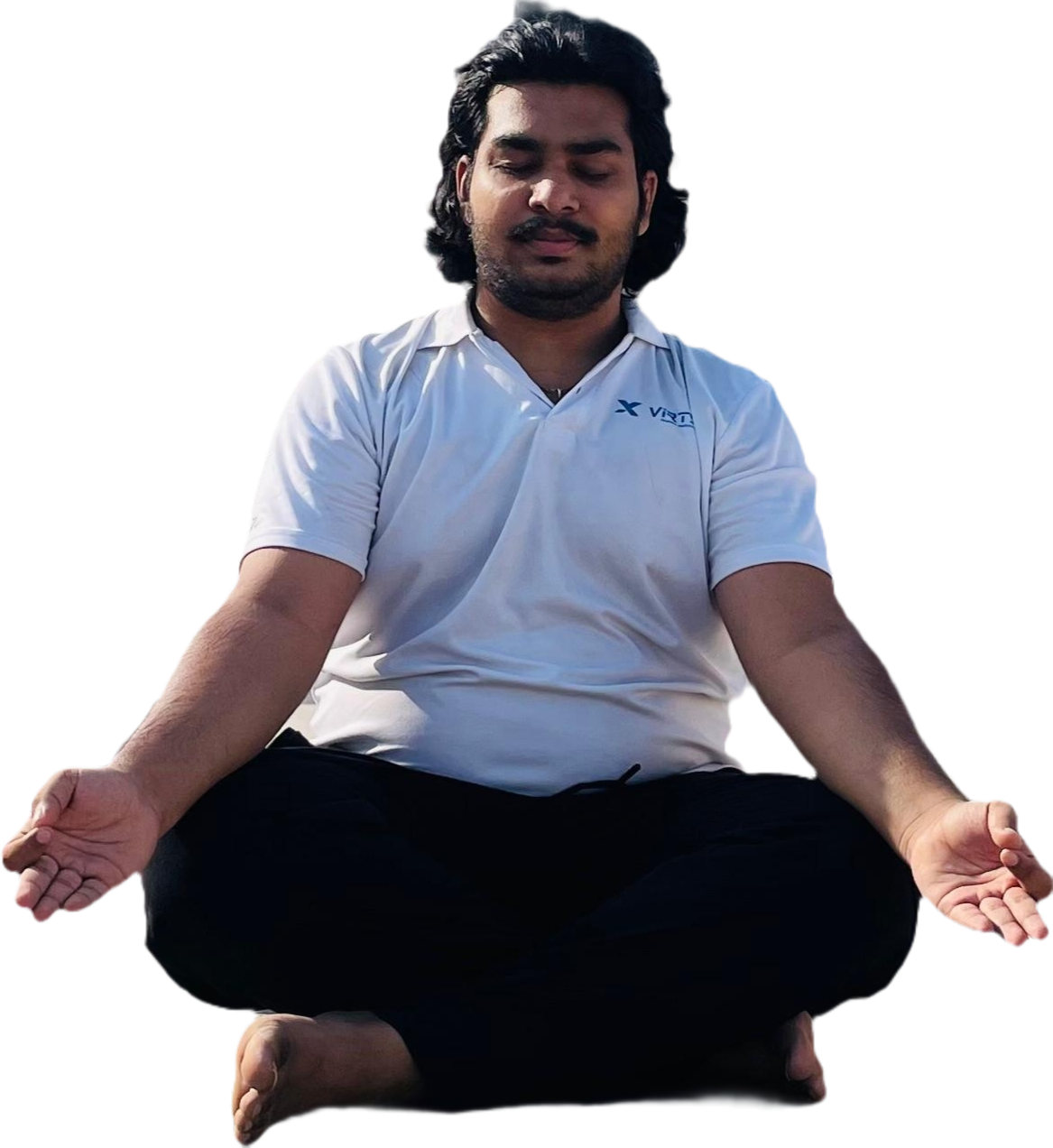 Venkatesh Kadali in a seated meditation pose